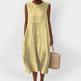 Vestido de algodão sem mangas elegante com bolsos