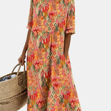 Ema | Vestido midi floral solto e leve