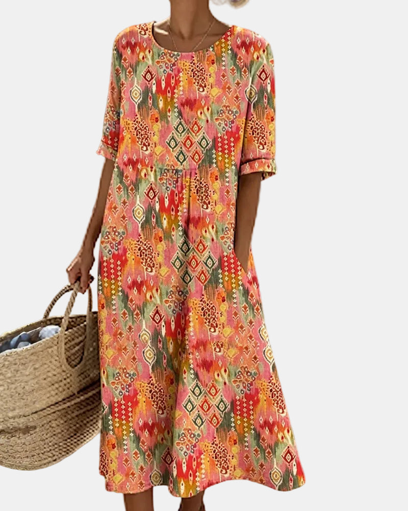 Ema | Vestido midi floral solto e leve