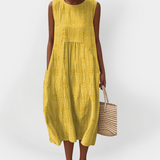 Vestido de algodão sem mangas elegante com bolsos