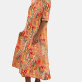 Ema | Vestido midi floral solto e leve