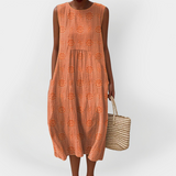 Vestido de algodão sem mangas elegante com bolsos