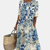 Alva | Vestido midi floral solto e leve