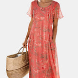 Maria | Vestido midi floral solto e leve