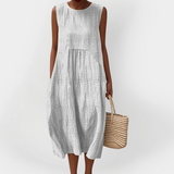 Vestido de algodão sem mangas elegante com bolsos
