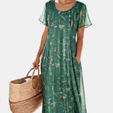 Maria | Vestido midi floral solto e leve