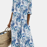 Ema | Vestido midi floral solto e leve