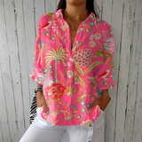 Jeanne | Blusa tropical com padrões florais coloridos