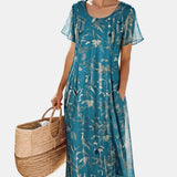 Maria | Vestido midi floral solto e leve