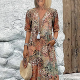 Roxana | Vestido Midi Envolvente Floral Vibrante