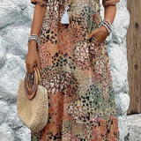 Roxana | Vestido Midi Envolvente Floral Vibrante