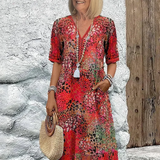 Roxana | Vestido Midi Envolvente Floral Vibrante