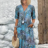 Roxana | Vestido Midi Envolvente Floral Vibrante
