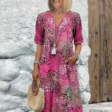 Roxana | Vestido Midi Envolvente Floral Vibrante