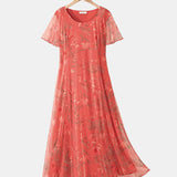 Maria | Vestido midi floral solto e leve