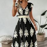 Candela | Vestido com decote em V