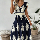 Candela | Vestido com decote em V